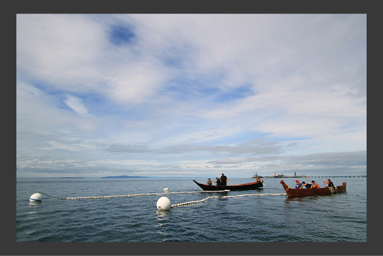 Photo of canoes on the water